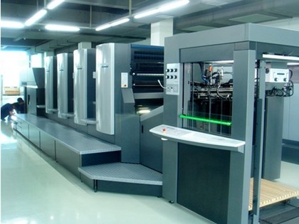 Roland four color printing machine